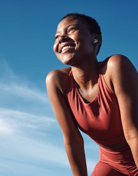 Lady smiles outdoors